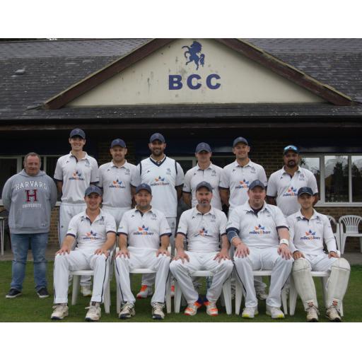1st XI secure promotion after victory at home to division champions.